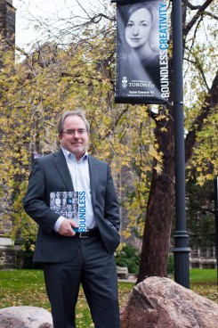 Vice-President of Advancement David Palmer poses with the Boundless handbook in front of Simcoe Hall. SARAH TAGUIAM/FILE PHOTO