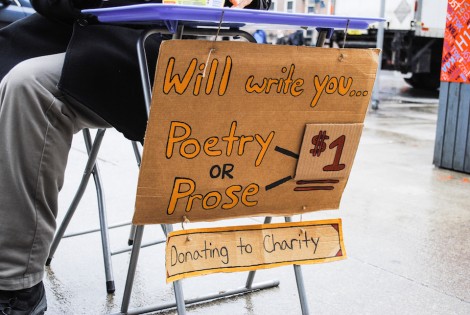The One Dollar Poem Guy at Robarts. Lisa Power/THE VARSITY