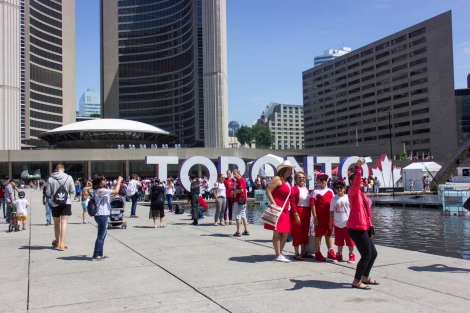 FEATURES_Canada_Day-KAITLYN_SIMPSON;THE_VARSITY-Nathan_Phillips_Toronto_Sign