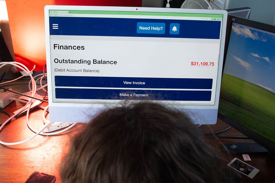 Person looking at finances page on their U of T ACORN page.