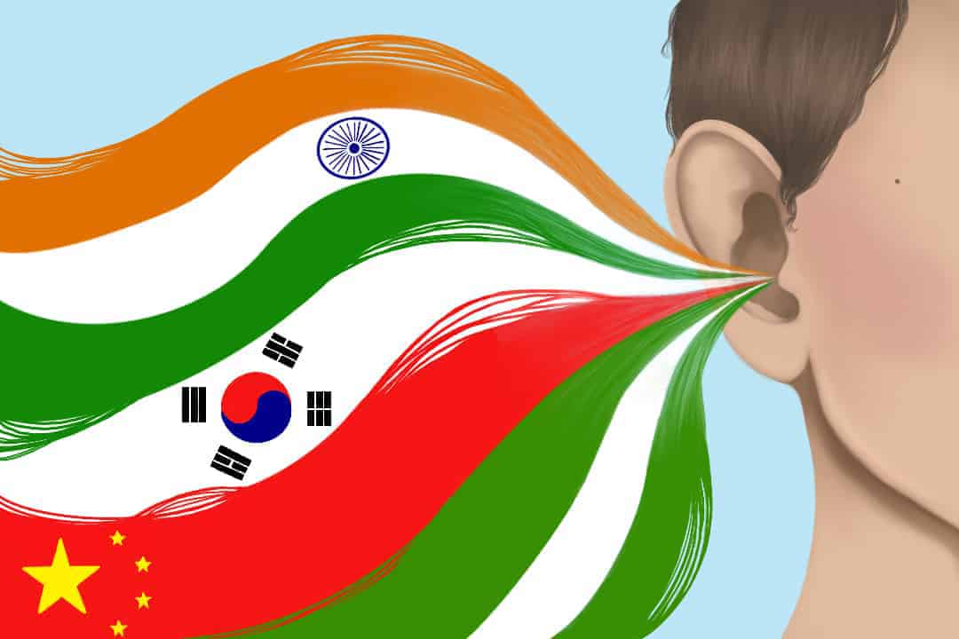 Flags of different countries flowing into an individual's ear.