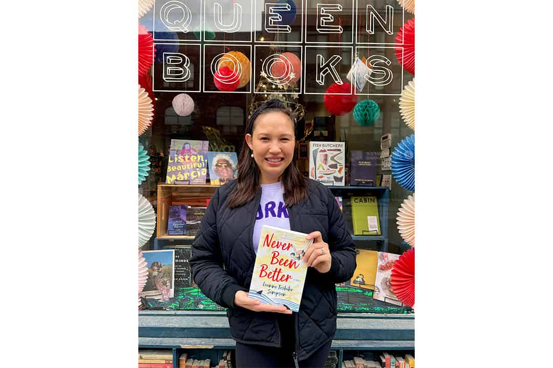 Author Leanne Toshiko Simpson proudly shows off her debut novel Never Been Better, an offbeat, heartfelt novel about three friends who met in a psychiatric ward. COURTESY OF LEANNE TOSHIKO