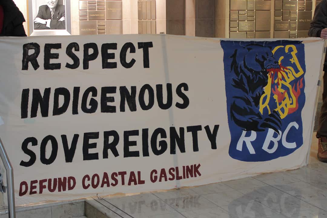 Banner that says "Respect Indigenous sovereignty".