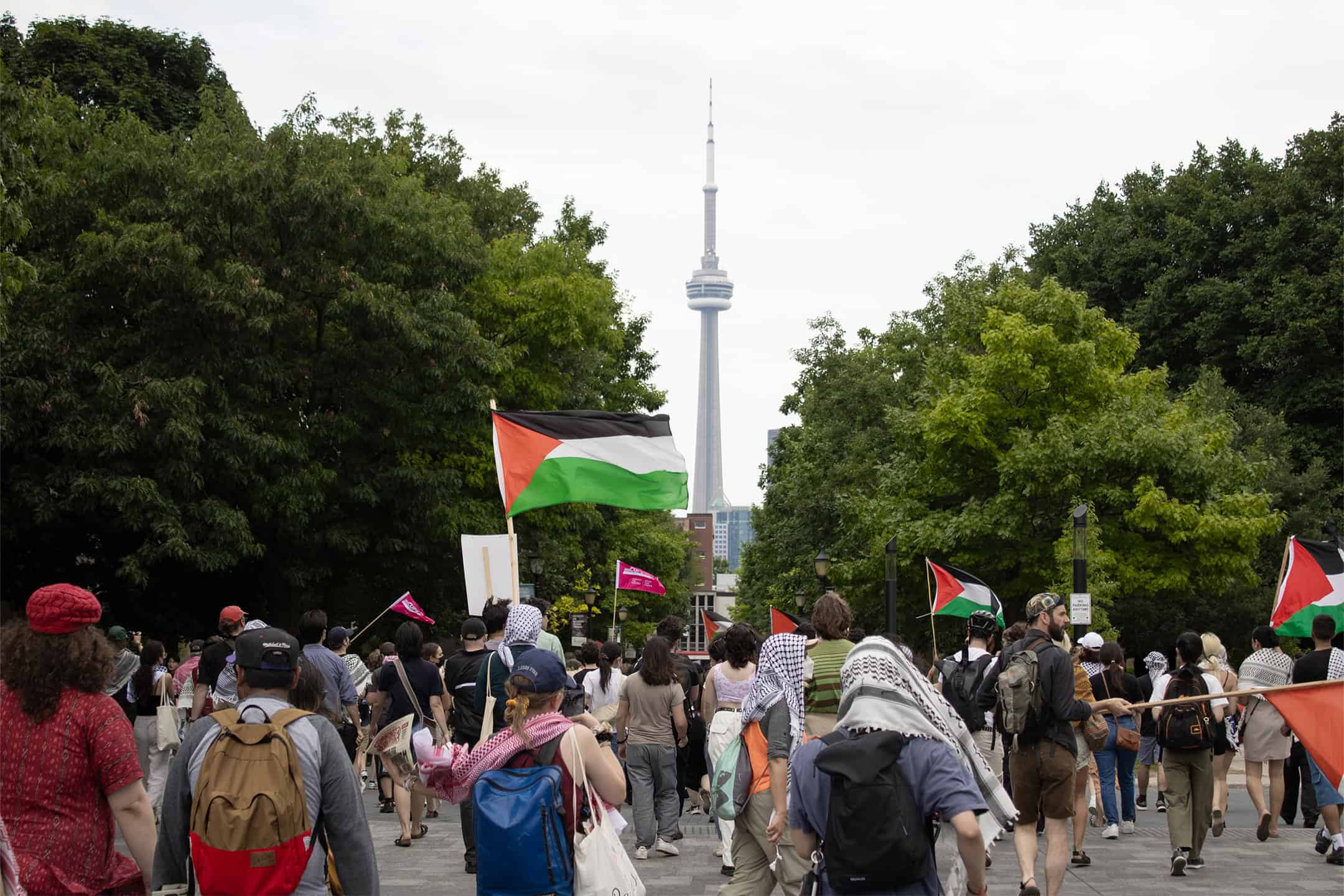 Student lead protests through downtown. JAMES BULLANOFF/THEVARSITY